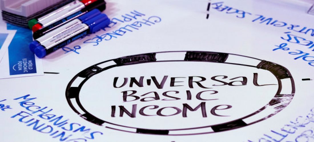 Universal Basic Income (UBI) s written on a table during a session at the World Economic Forum (WEF) annual meeting in Davos, Switzerland January 23, 2018  REUTERS/Denis Balibouse